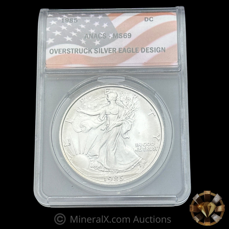 1985 1oz Daniel Carr Overstruck Silver Eagle Design Coin ANACS MS69