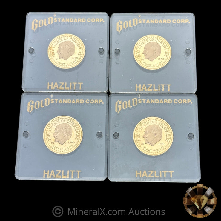 x4 1/4oz 1980 Gold Standard Corp “Free Choice of Currencies” Proof Gold Coins w/ Rare Original Acrylic Cases (1oz Total Pure Gold)